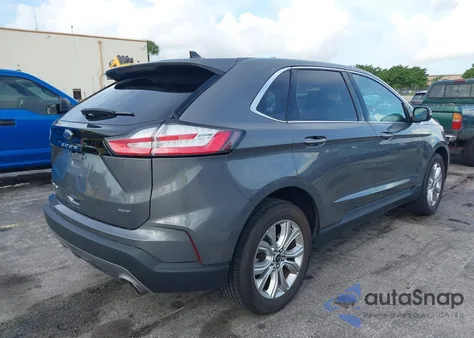 2023 Ford Edge Titanium z USA, uszkodzony, nr VIN 2FMPK4K99PBA27181